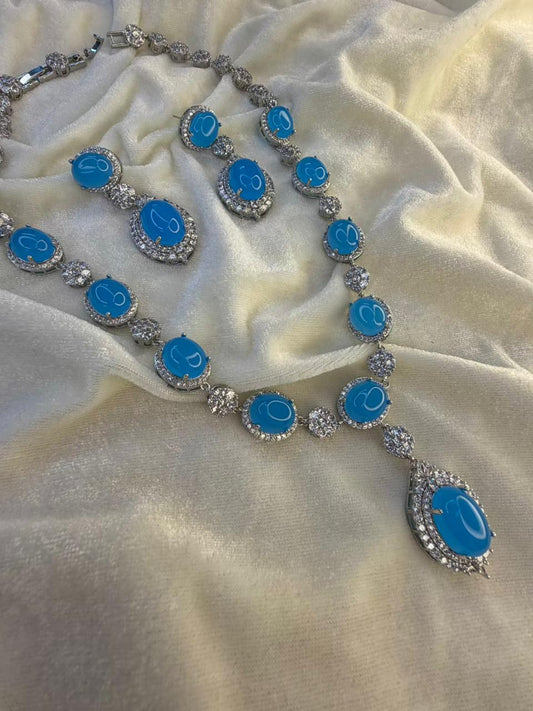 Oval Halo Design Rhodium-Plated Necklace Set with Turquoise Blue Stones