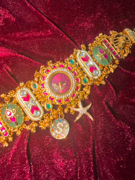 Royal Ruby Round Dial Heritage Watch Rakhi in Premium Swarovski (Free Initial)