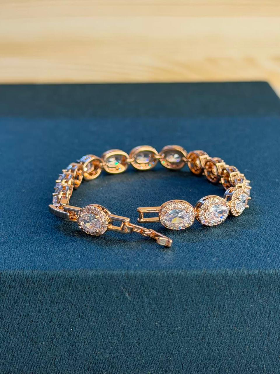White Oval shaped Rose Gold Plated Tennis Bracelet