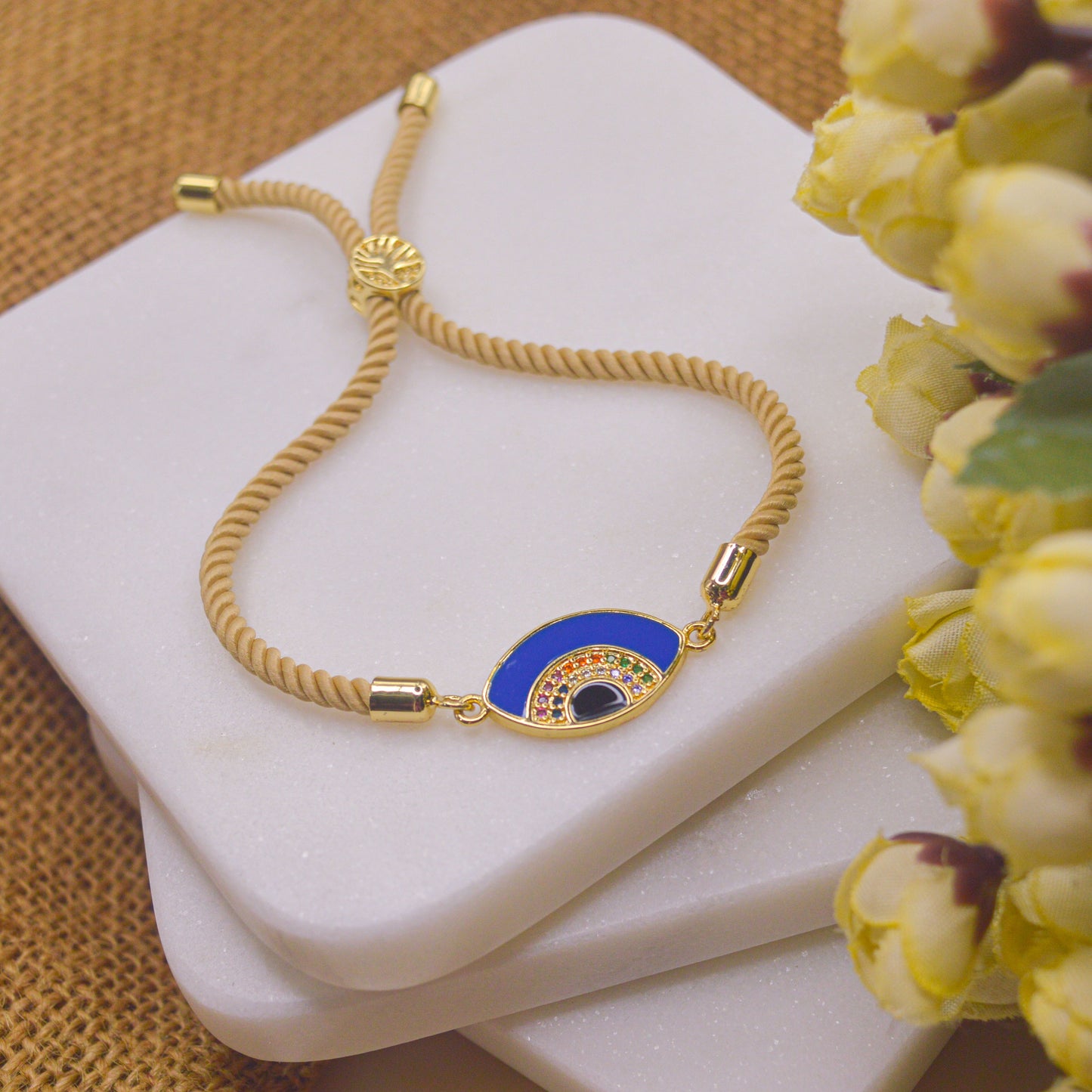 Blue Evil Eye Bracelet in Cream Band - Gold