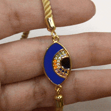 Blue Evil Eye Bracelet in Cream Band - Gold