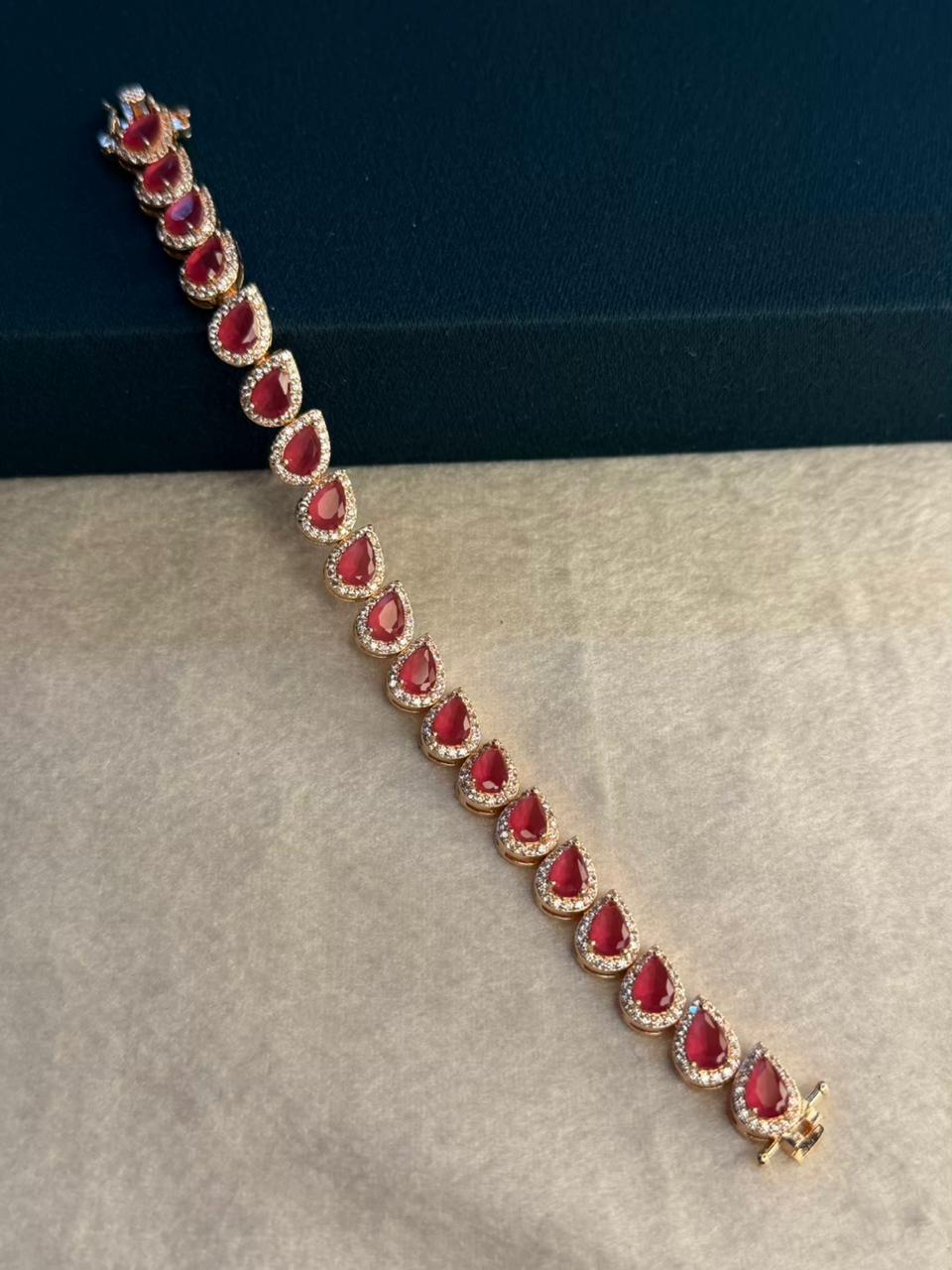 Red Ruby Drop Shape Rose Gold Plated Tennis Bracelet