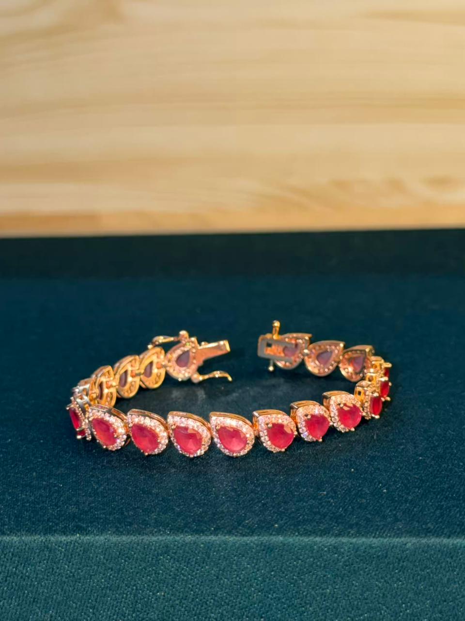 Red Ruby Drop Shape Rose Gold Plated Tennis Bracelet