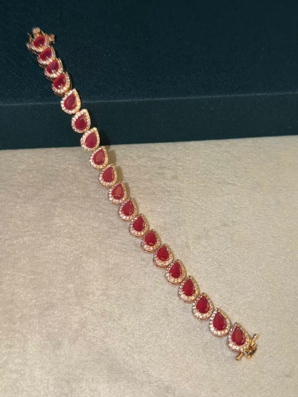 Red Ruby Drop Shape Rose Gold Plated Tennis Bracelet