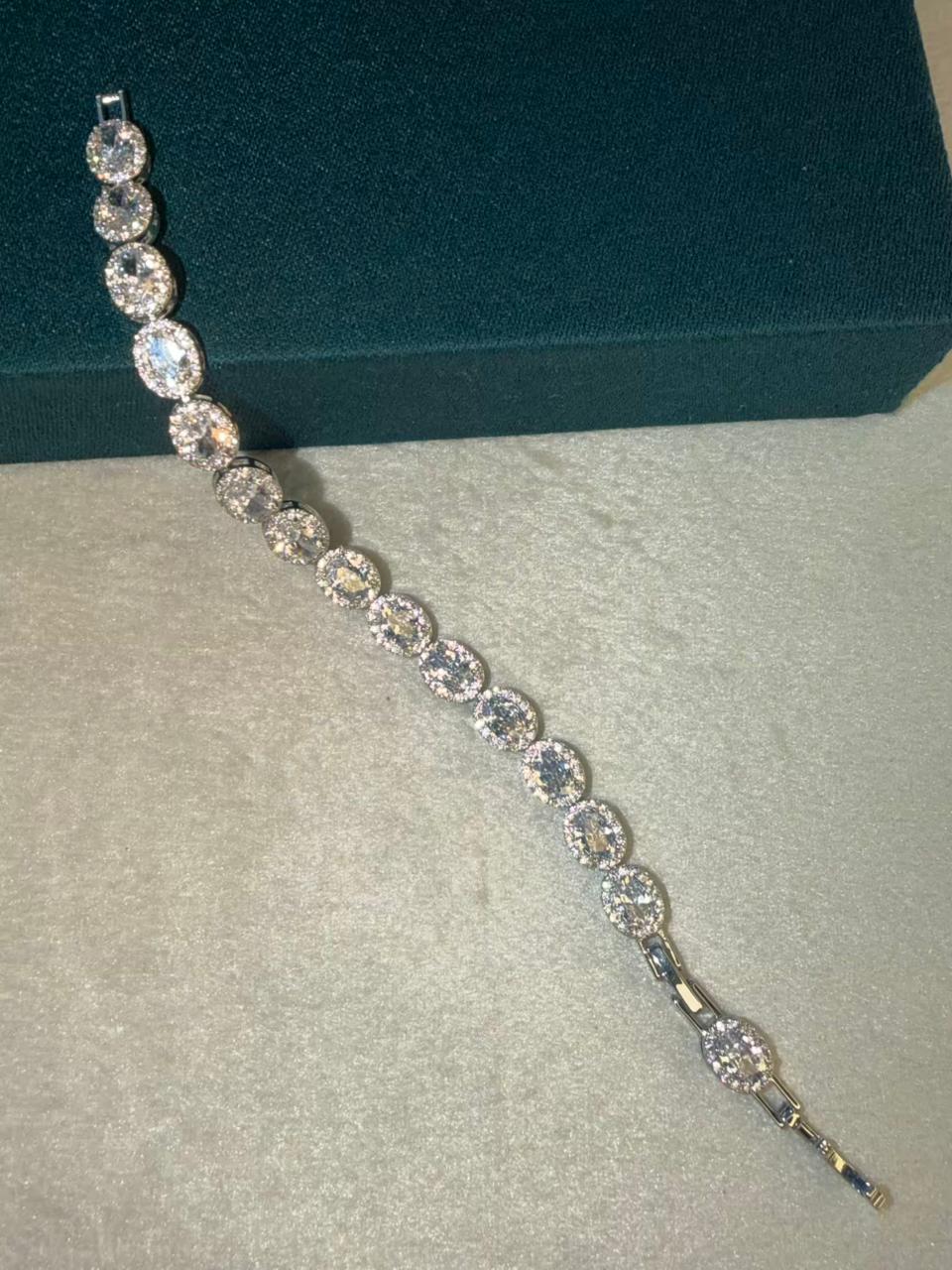 White Oval shaped Silver Plated Tennis Bracelet