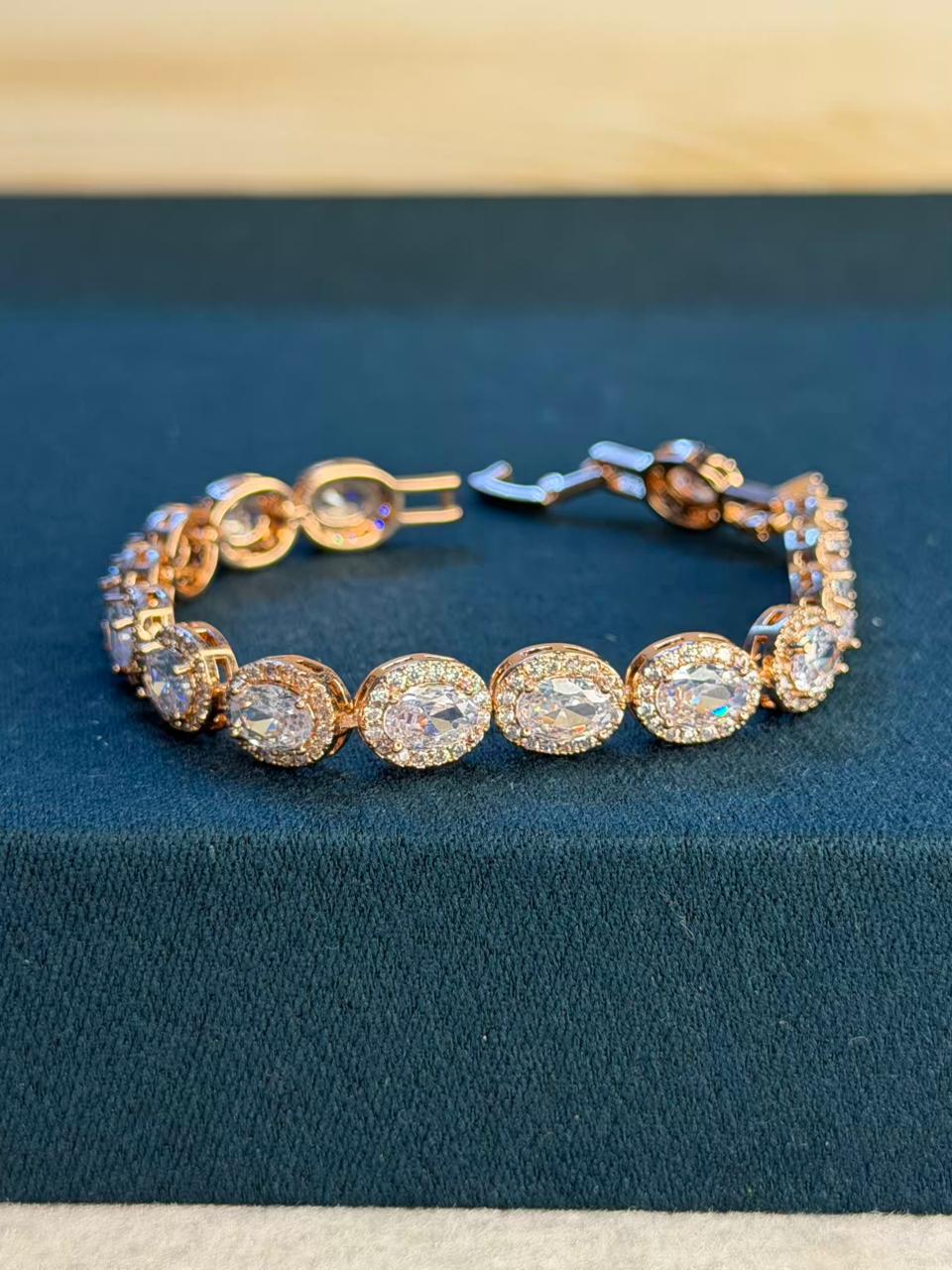 White Oval shaped Rose Gold Plated Tennis Bracelet