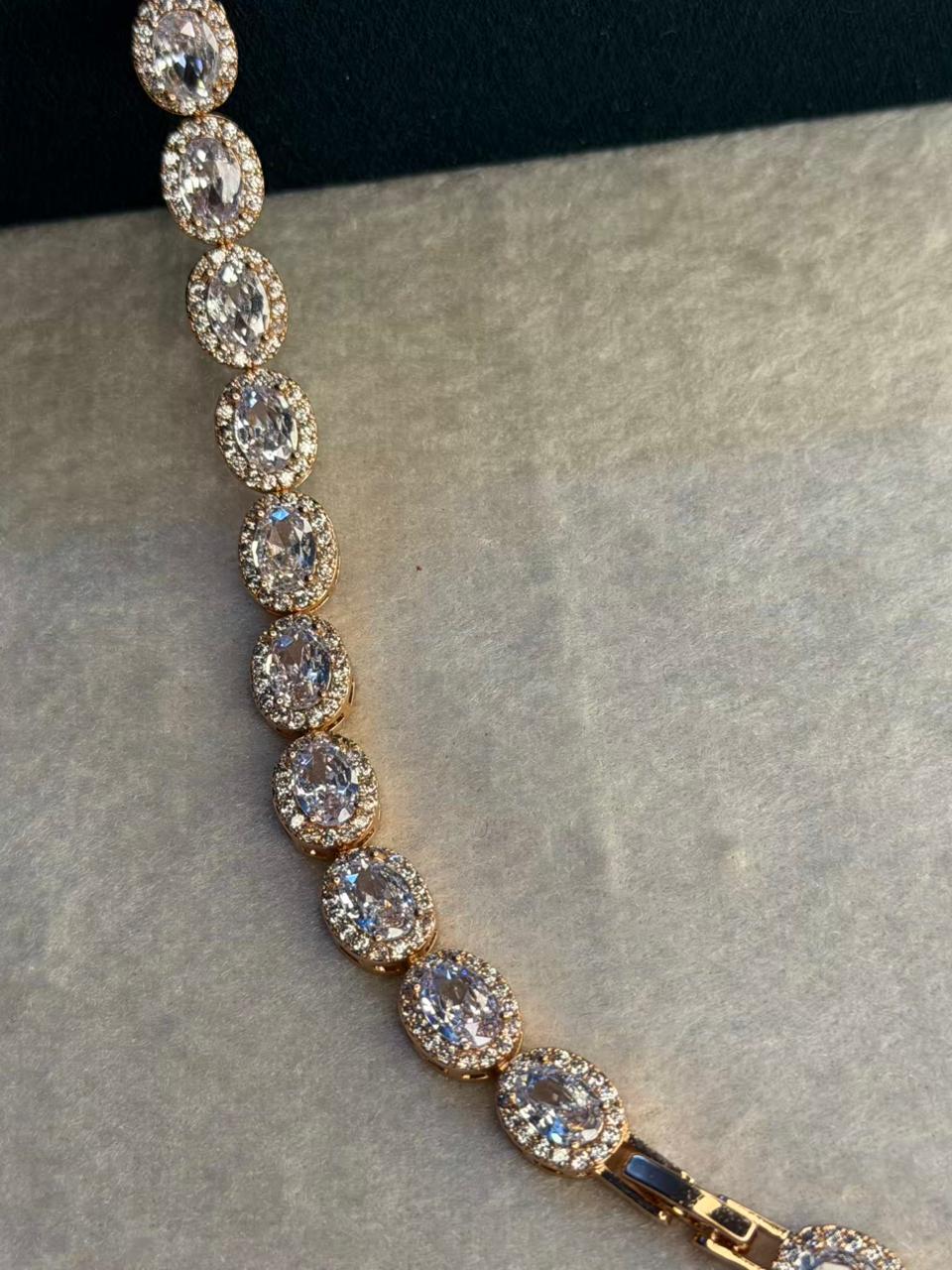 White Oval shaped Rose Gold Plated Tennis Bracelet