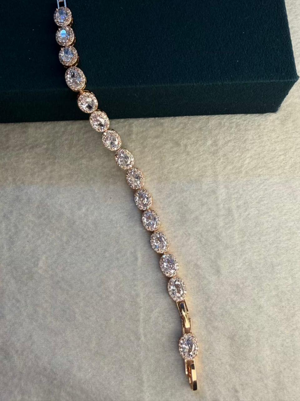 White Oval shaped Rose Gold Plated Tennis Bracelet