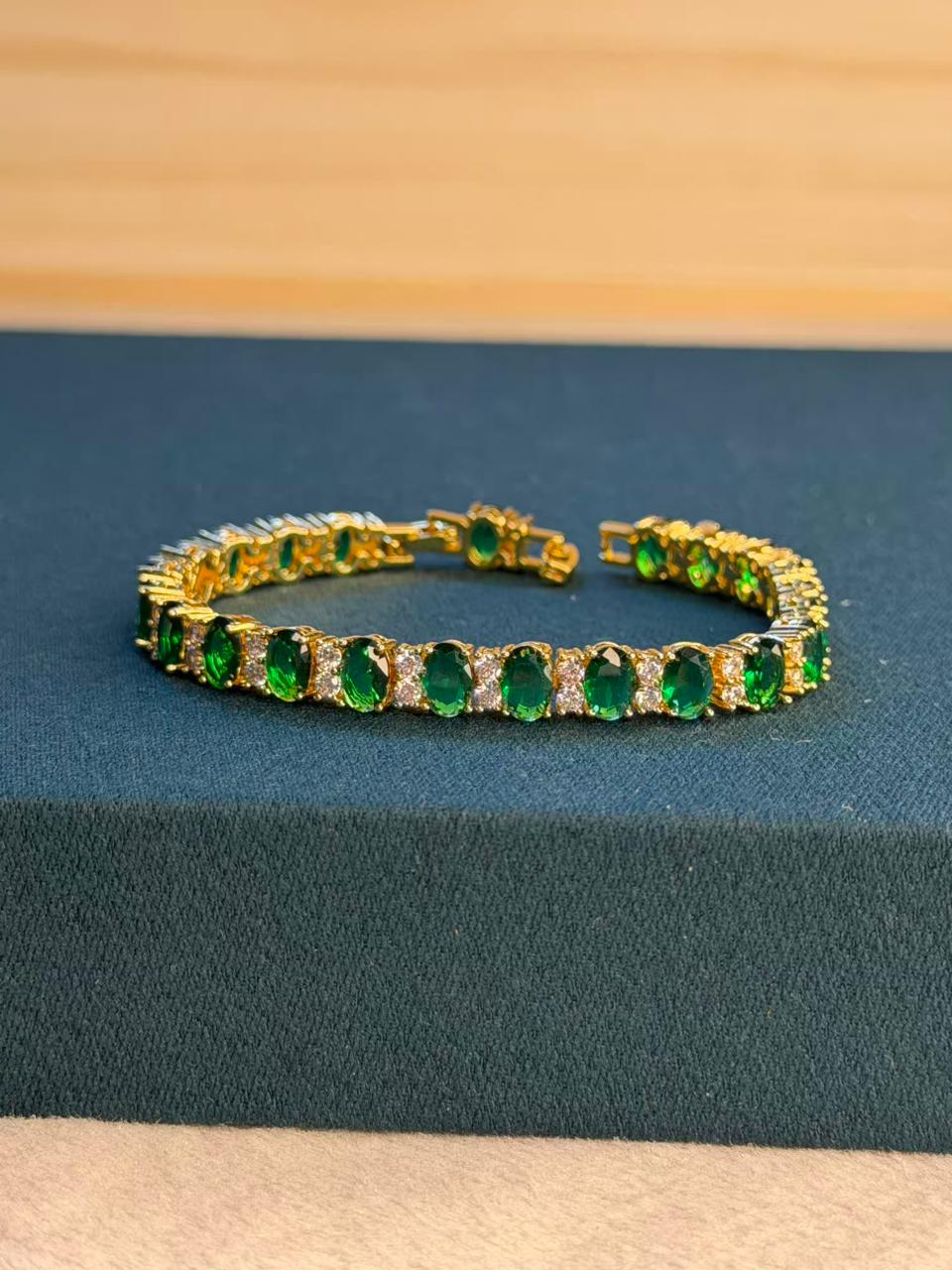 Emerald Green Oval Shape Gold Plated Tennis Bracelet