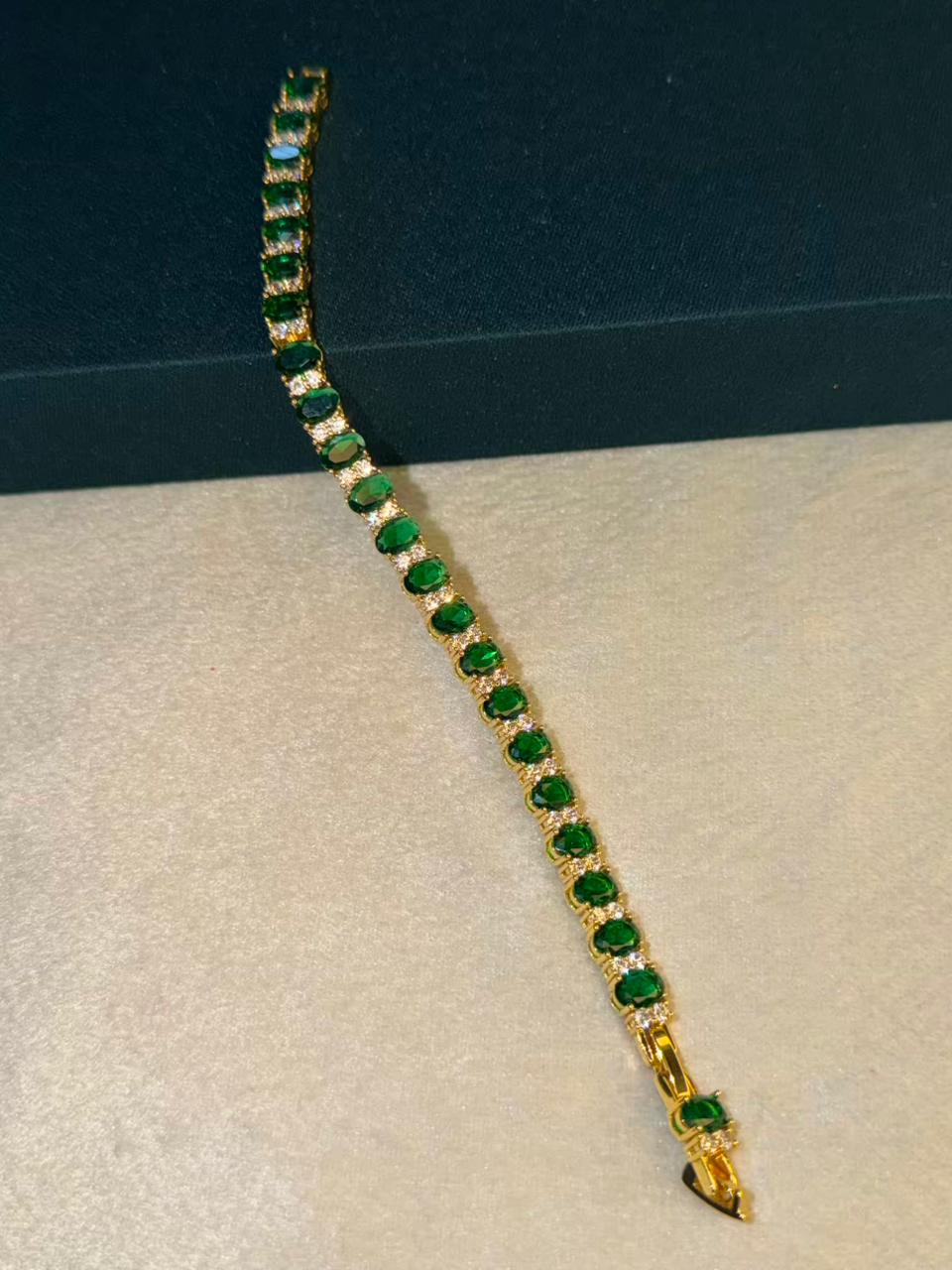 Emerald Green Oval Shape Gold Plated Tennis Bracelet