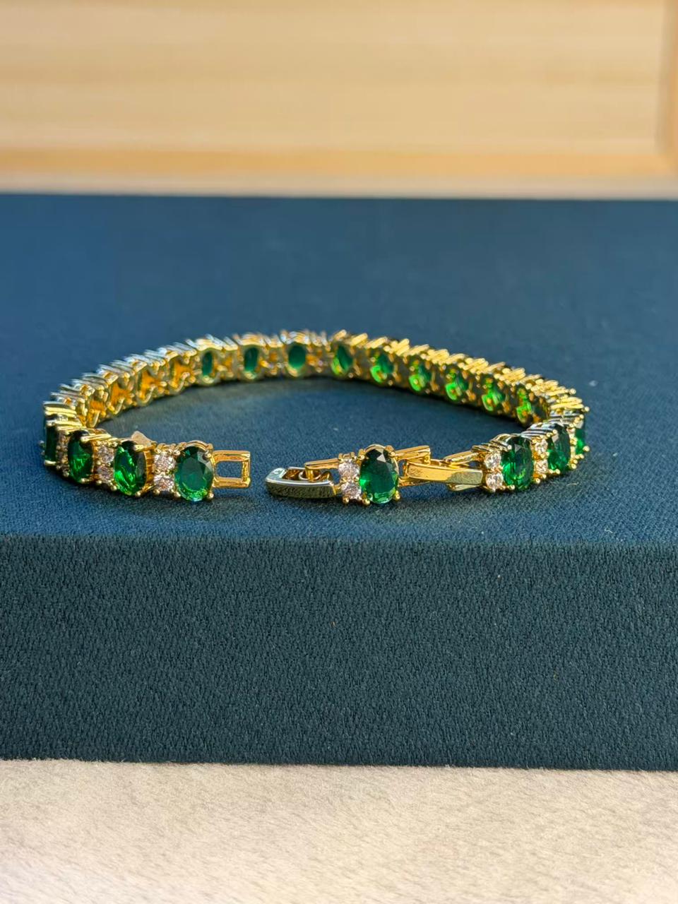 Emerald Green Oval Shape Gold Plated Tennis Bracelet
