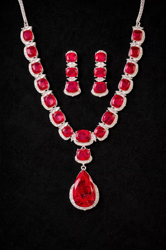 Ruby Red Luxury Studded Necklace and Studs Sets in Rhodium Silver Plating