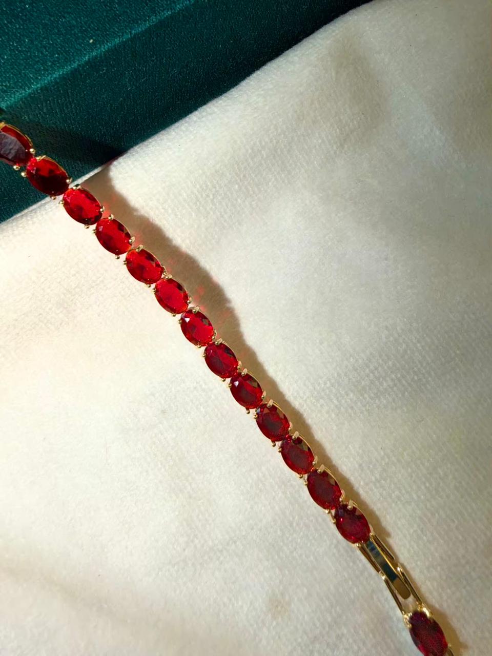 Ruby Red Oval Shaped Gold Plated Tennis Bracelet