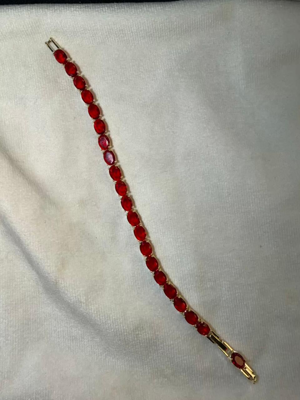 Ruby Red Oval Shaped Gold Plated Tennis Bracelet