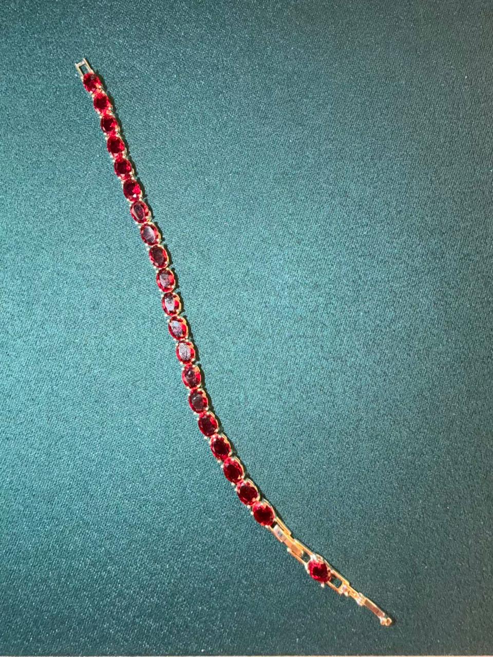 Ruby Red Oval Shaped Gold Plated Tennis Bracelet