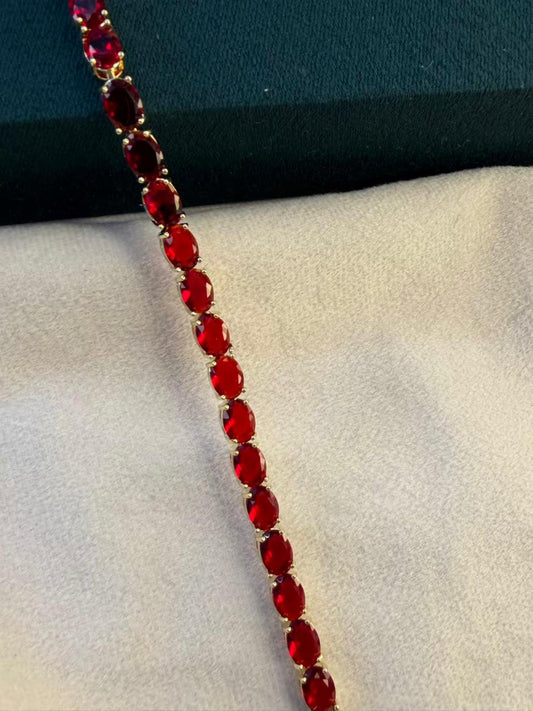 Ruby Red Oval Shaped Gold Plated Tennis Bracelet