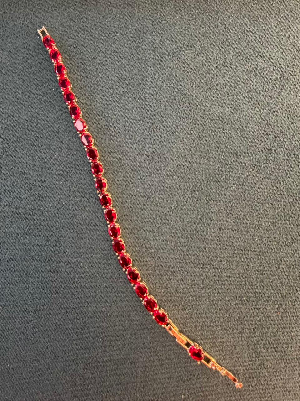 Ruby Red Oval Shaped Gold Plated Tennis Bracelet