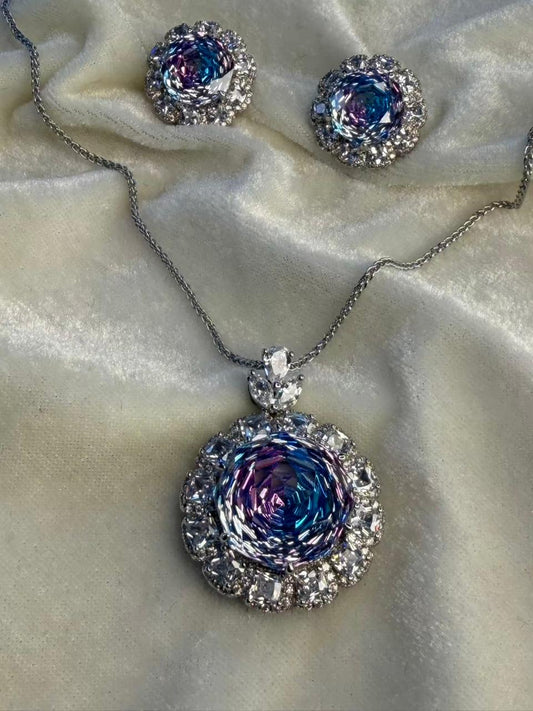Round Floral Halo Rhodium-Plated Silver Necklace Set with Iridescent Blue Stones