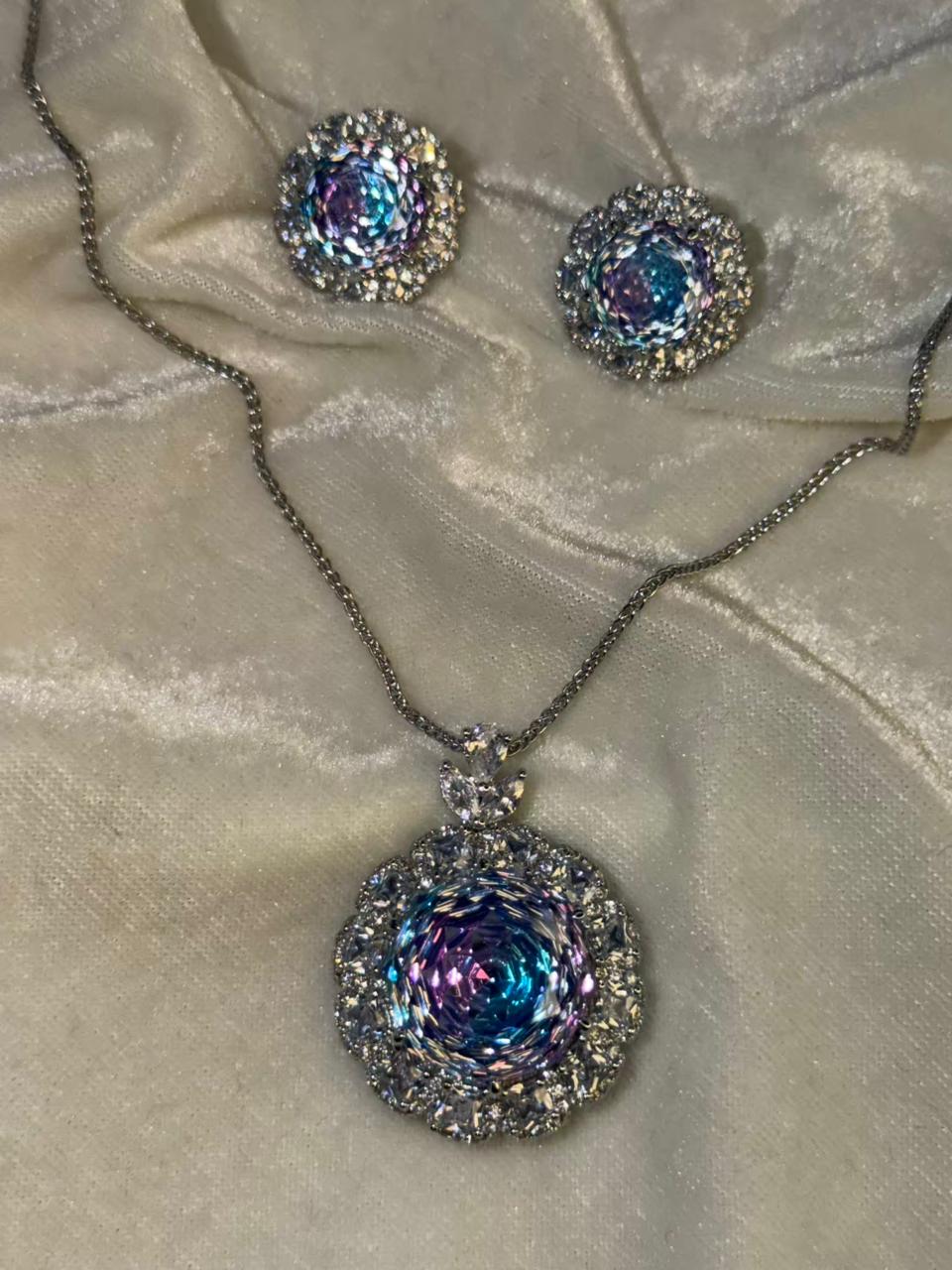 Round Floral Halo Rhodium-Plated Silver Necklace Set with Iridescent Blue Stones