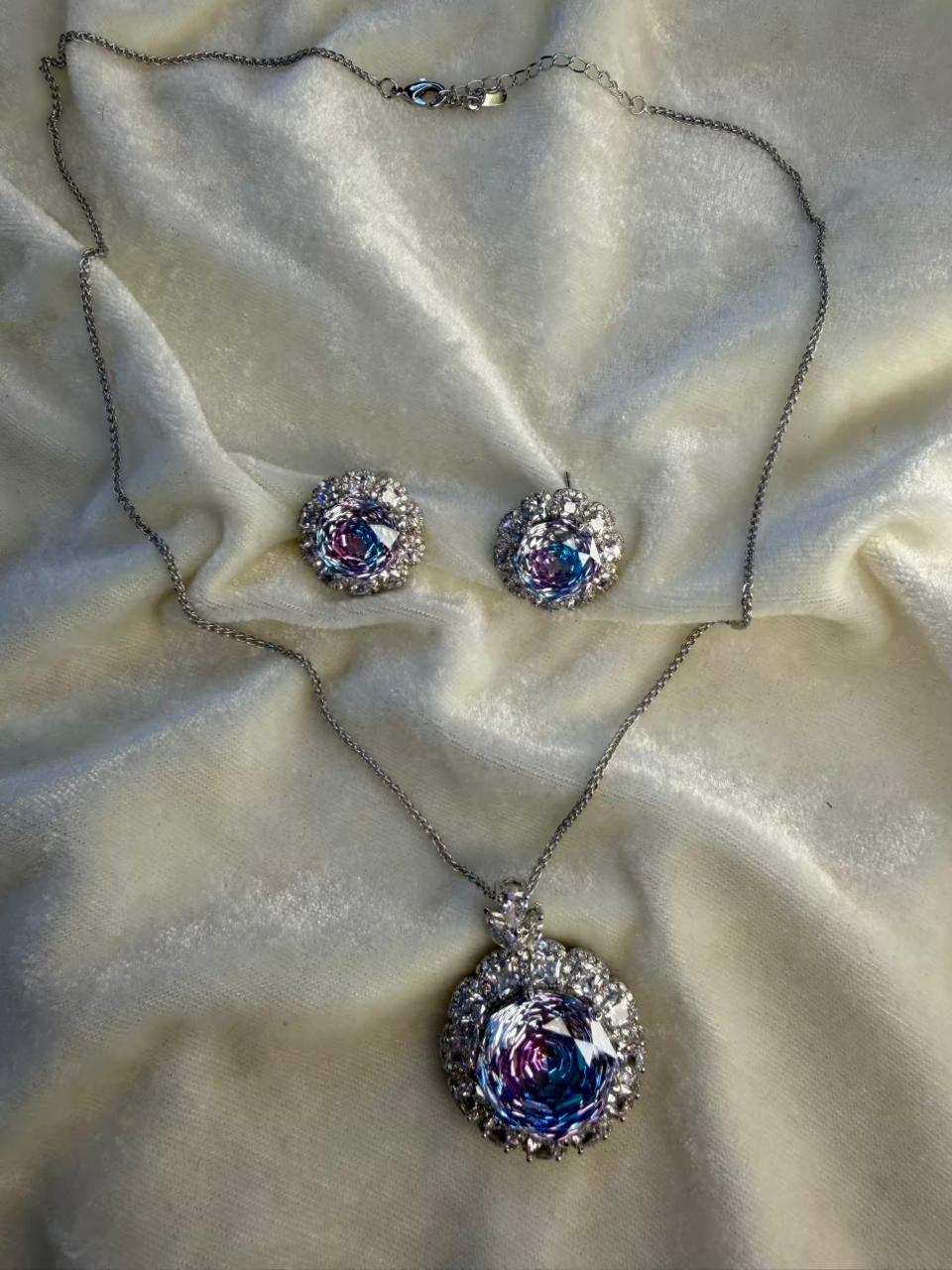 Round Floral Halo Rhodium-Plated Silver Necklace Set with Iridescent Blue Stones