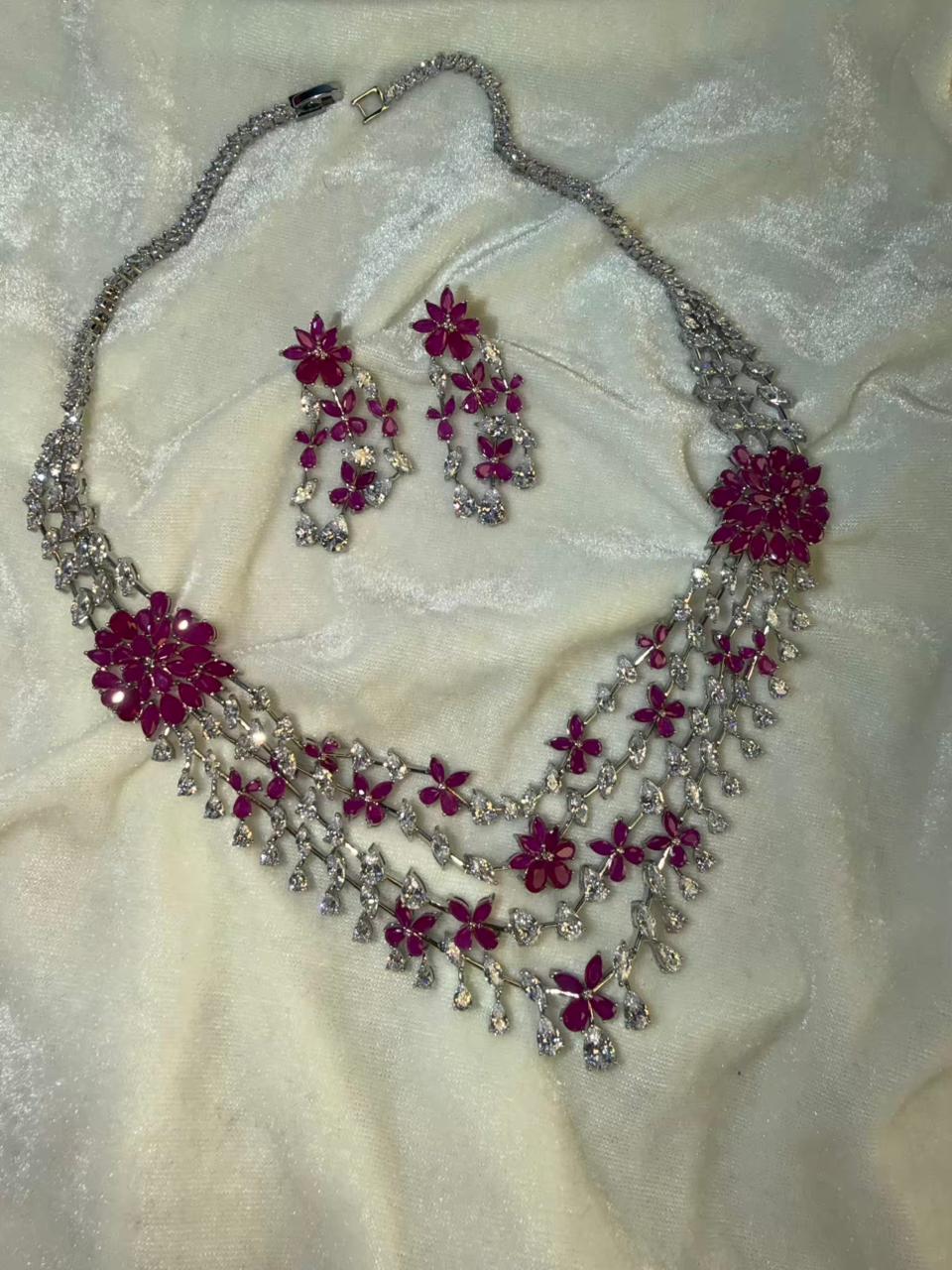 Floral Cascade Design Rhodium-Plated Silver Necklace Set with Ruby Pink Stones