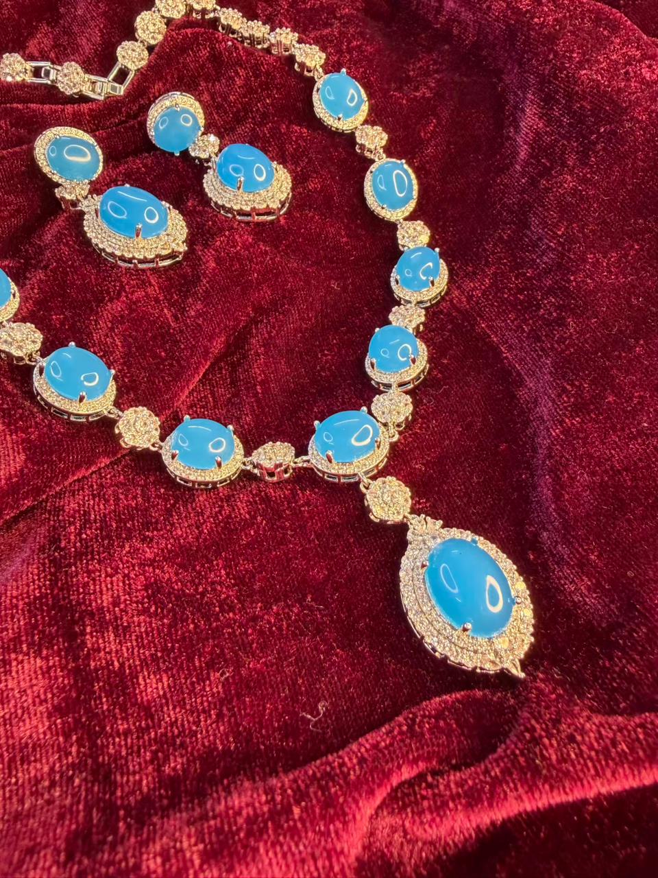Oval Halo Design Rhodium-Plated Necklace Set with Turquoise Blue Stones