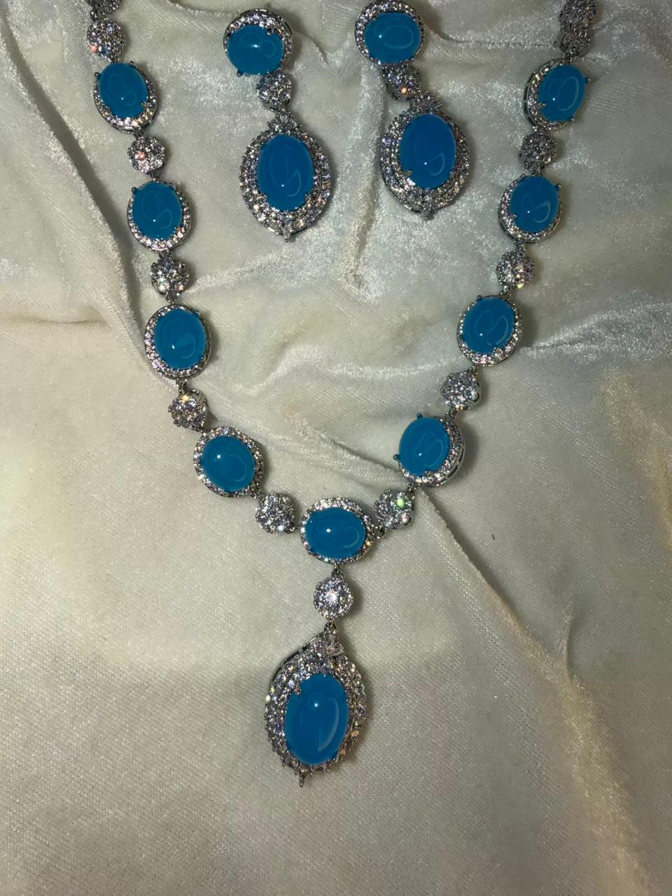Oval Halo Design Rhodium-Plated Necklace Set with Turquoise Blue Stones