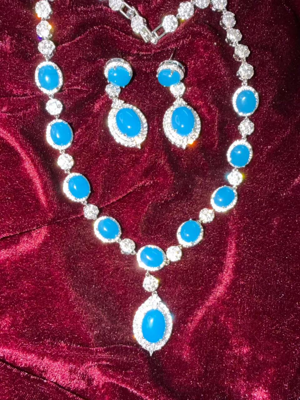 Oval Halo Design Rhodium-Plated Necklace Set with Turquoise Blue Stones