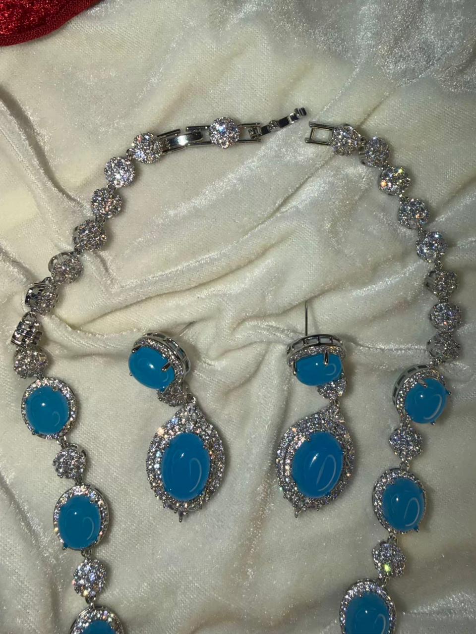 Oval Halo Design Rhodium-Plated Necklace Set with Turquoise Blue Stones
