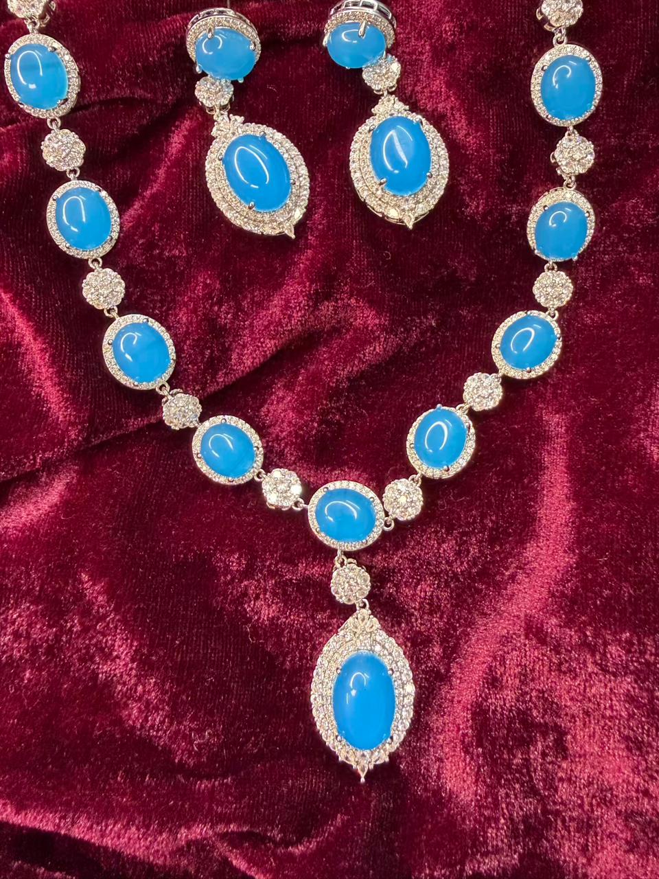 Oval Halo Design Rhodium-Plated Necklace Set with Turquoise Blue Stones