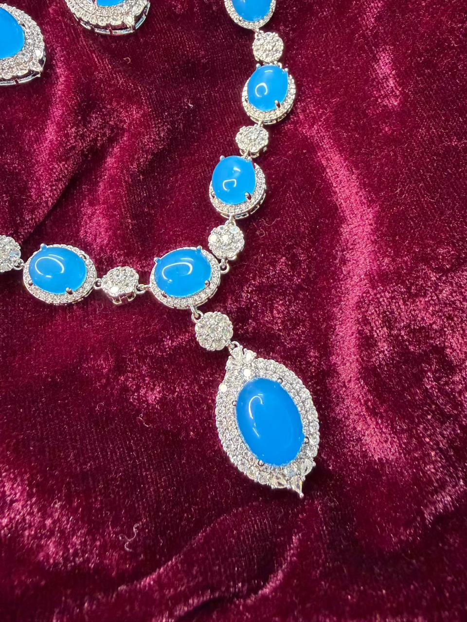 Oval Halo Design Rhodium-Plated Necklace Set with Turquoise Blue Stones