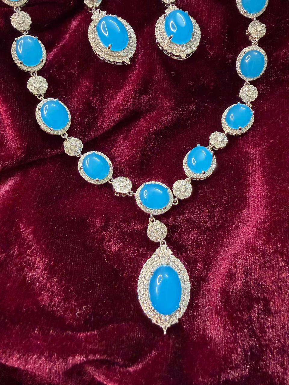 Oval Halo Design Rhodium-Plated Necklace Set with Turquoise Blue Stones
