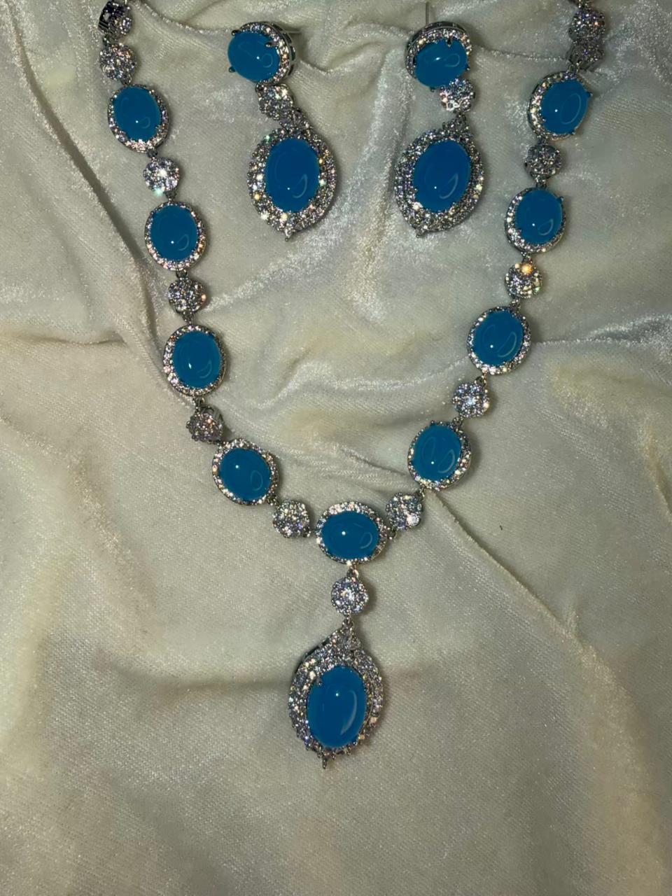 Oval Halo Design Rhodium-Plated Necklace Set with Turquoise Blue Stones