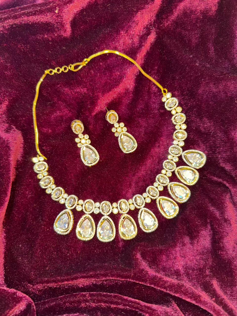 Oval and Teardrop Design Gold-Plated Necklace Set with Clear Stones