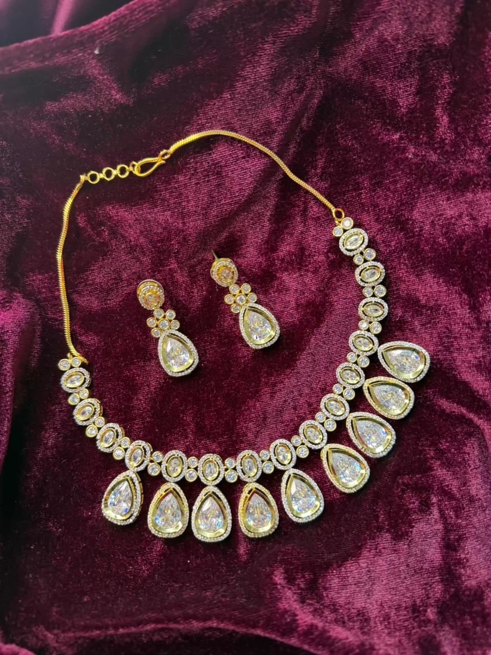Oval and Teardrop Design Gold-Plated Necklace Set with Clear Stones