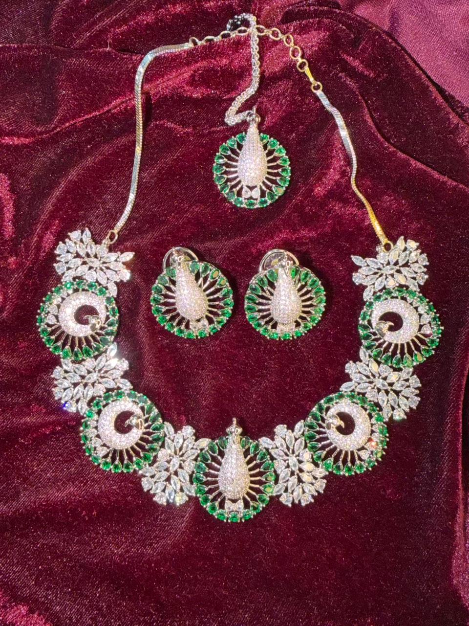 Peacock Motif Design Rhodium-Plated Necklace Set with Emerald Green Stones