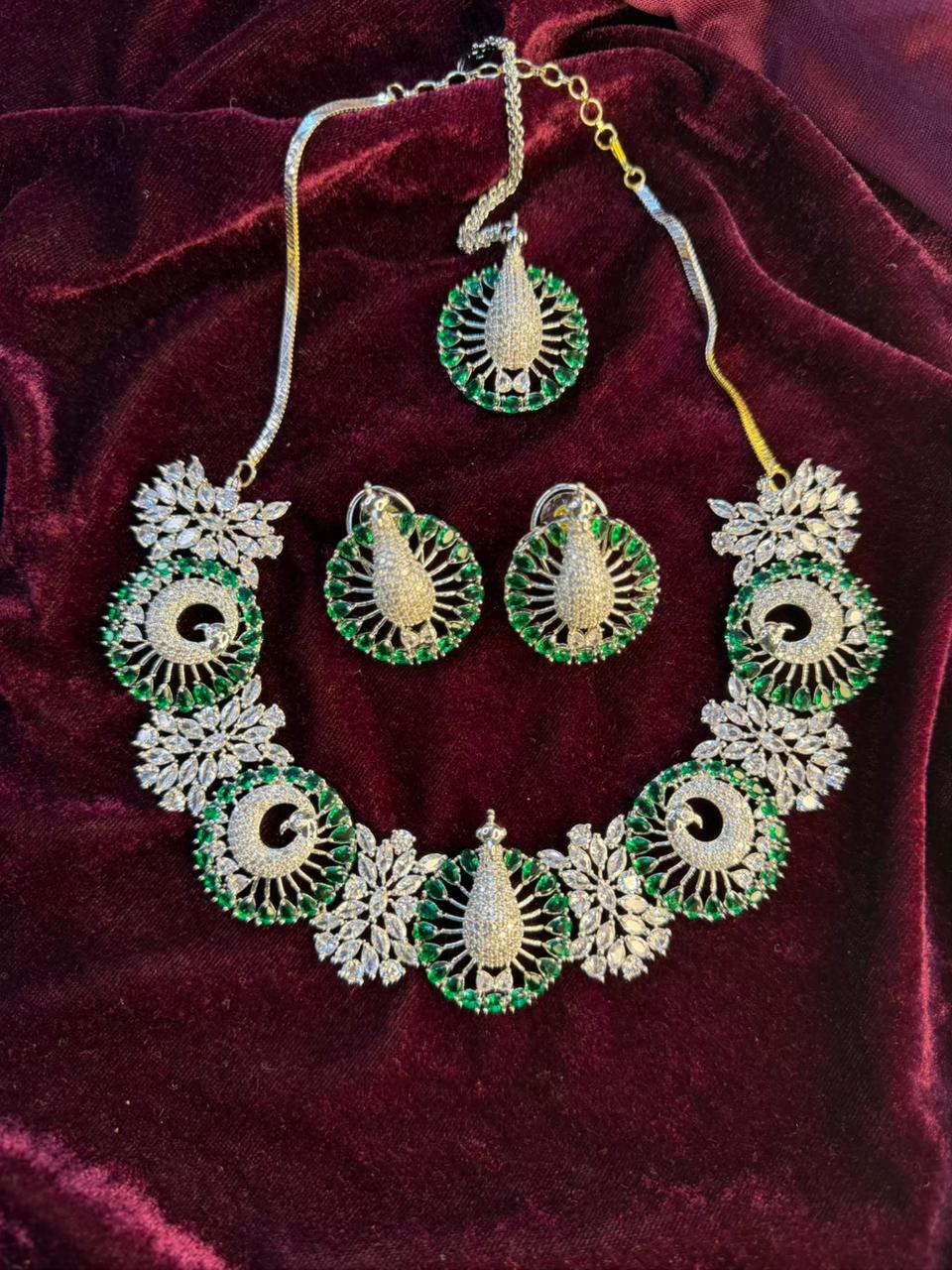 Peacock Motif Design Rhodium-Plated Necklace Set with Emerald Green Stones
