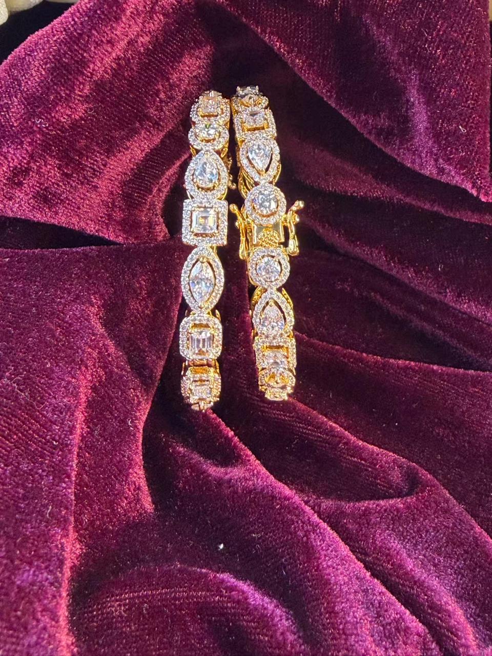Oval And Emerald Cut Gold Plated Diamond Designer Bangles Openable Upto Size 2.8