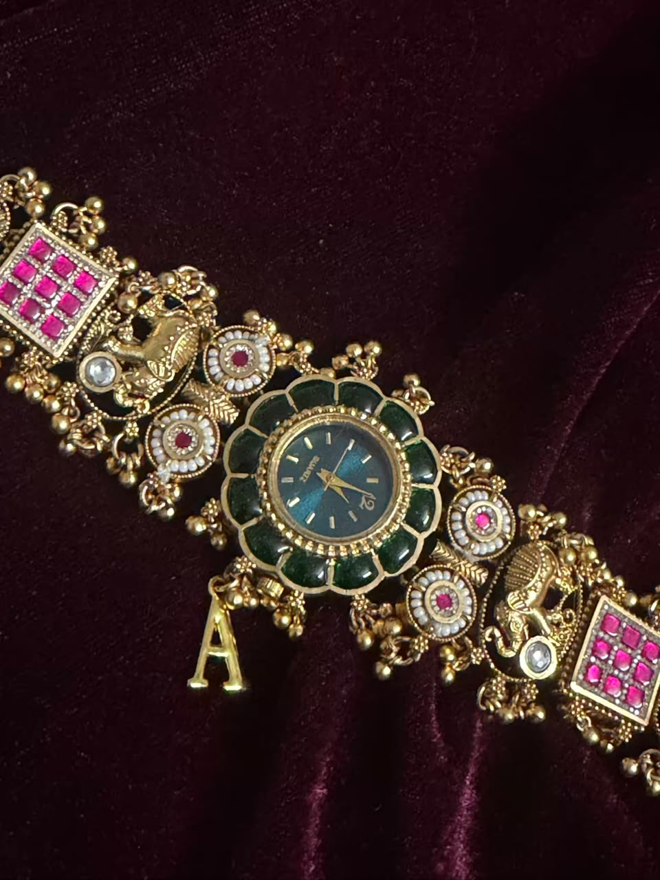 Maharaja Emerald Round Dial Designer Watch Rakhi in Premium Swarovski (Free Initial)