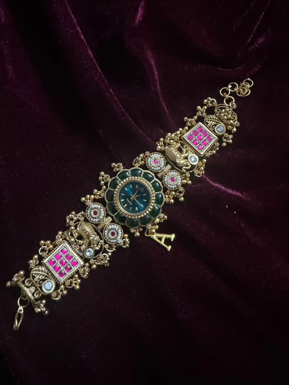Maharaja Emerald Round Dial Designer Watch Rakhi in Premium Swarovski (Free Initial)