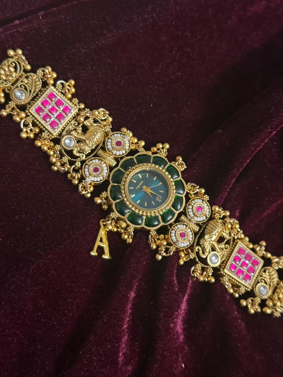 Maharaja Emerald Round Dial Designer Watch Rakhi in Premium Swarovski (Free Initial)