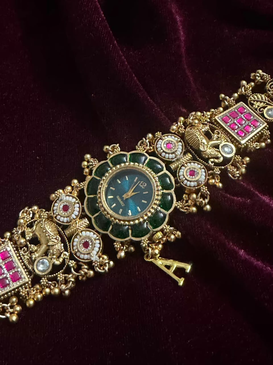 Maharaja Emerald Round Dial Designer Watch Rakhi in Premium Swarovski (Free Initial)