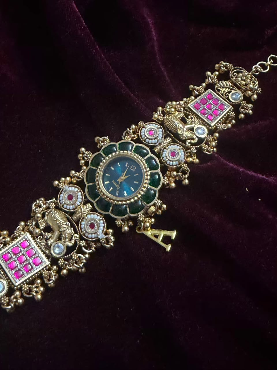 Maharaja Emerald Round Dial Designer Watch Rakhi in Premium Swarovski (Free Initial)