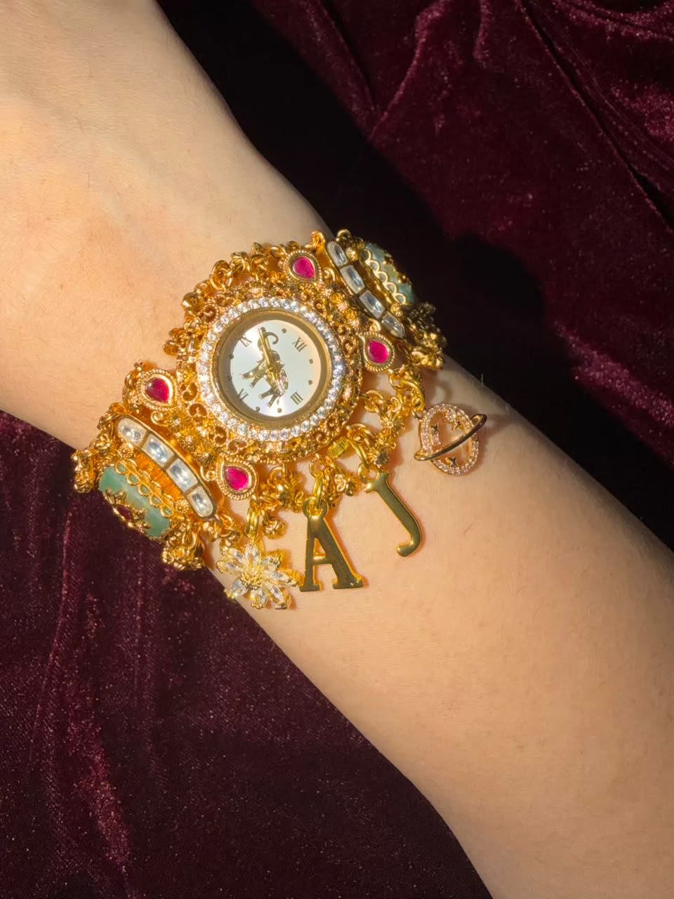 Shahi Mayuri Heritage Watch Rakhi in Premium Swarovski (Free Initial)