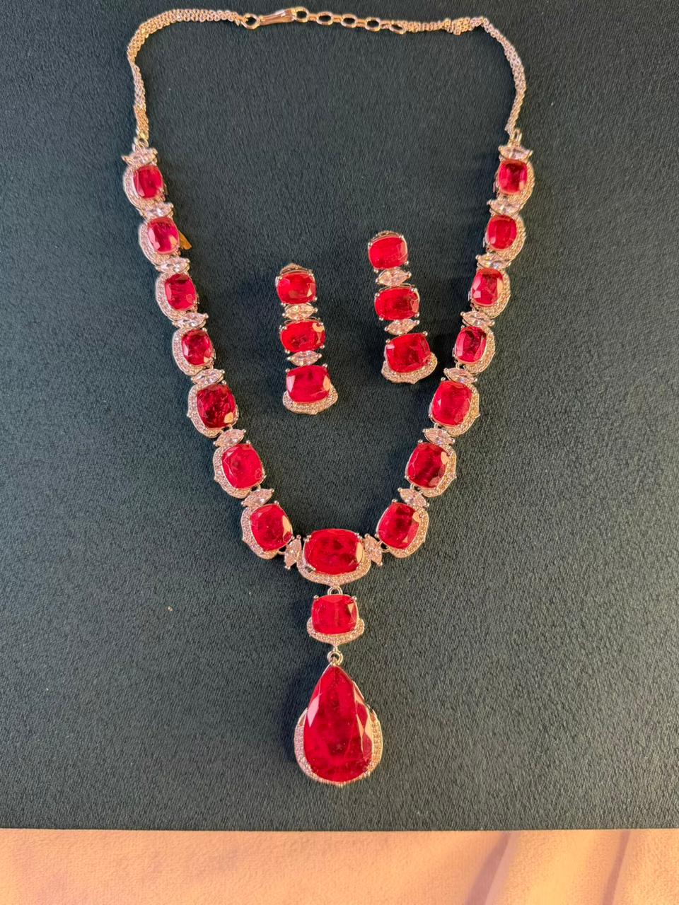 Ruby Red Luxury Studded Necklace and Studs Sets in Rhodium Silver Plating
