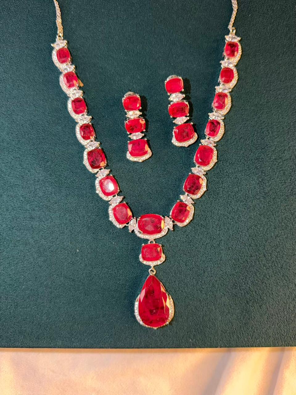 Ruby Red Luxury Studded Necklace and Studs Sets in Rhodium Silver Plating