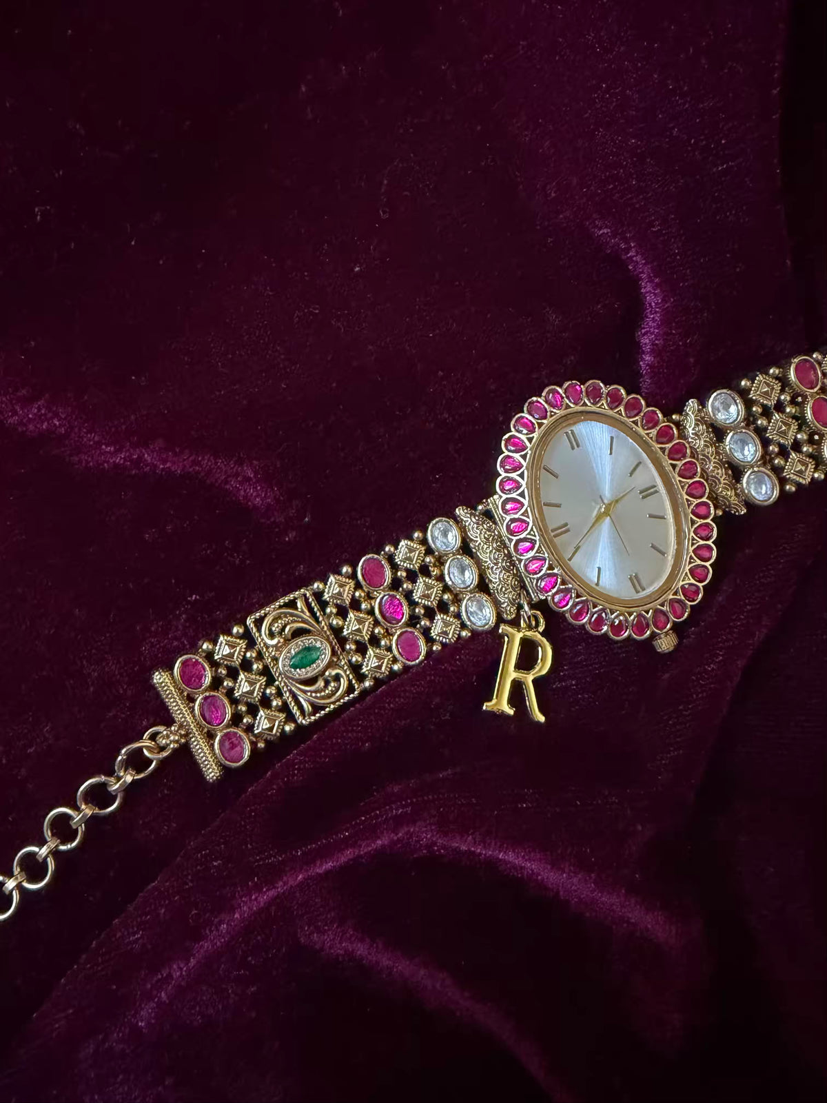 Oval Dial Maharani Bracelet Watch Rakhi in Premium Swarovski – Gold & Ruby Pink
