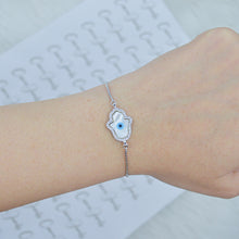 Load image into Gallery viewer, Silver Hamsa Hand Mother of Pearl Evil Eye Adjustable Bracelet

