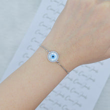 Load image into Gallery viewer, Silver Mother of Pearl Round Evil Eye Bracelet
