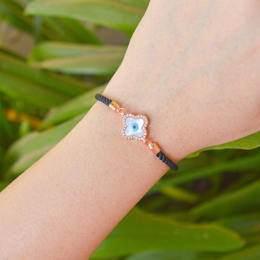 Clover Pearl Studded Evil Eye Black Band Bracelet ( Rose Gold)